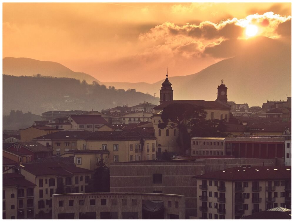 Campanile del Duomo e Torre dell'Orologio al tramonto – rinnovo patente ad Avellino